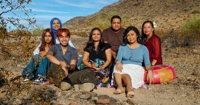 APCA team members in Arizona outdoors with desert backdrop, promoting free AHCCCS and Medicaid enrollment help